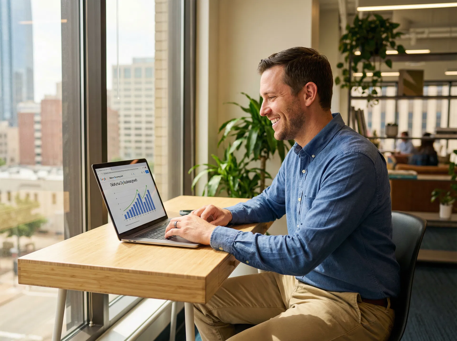 Justin reviewing OKC SEO results on laptop