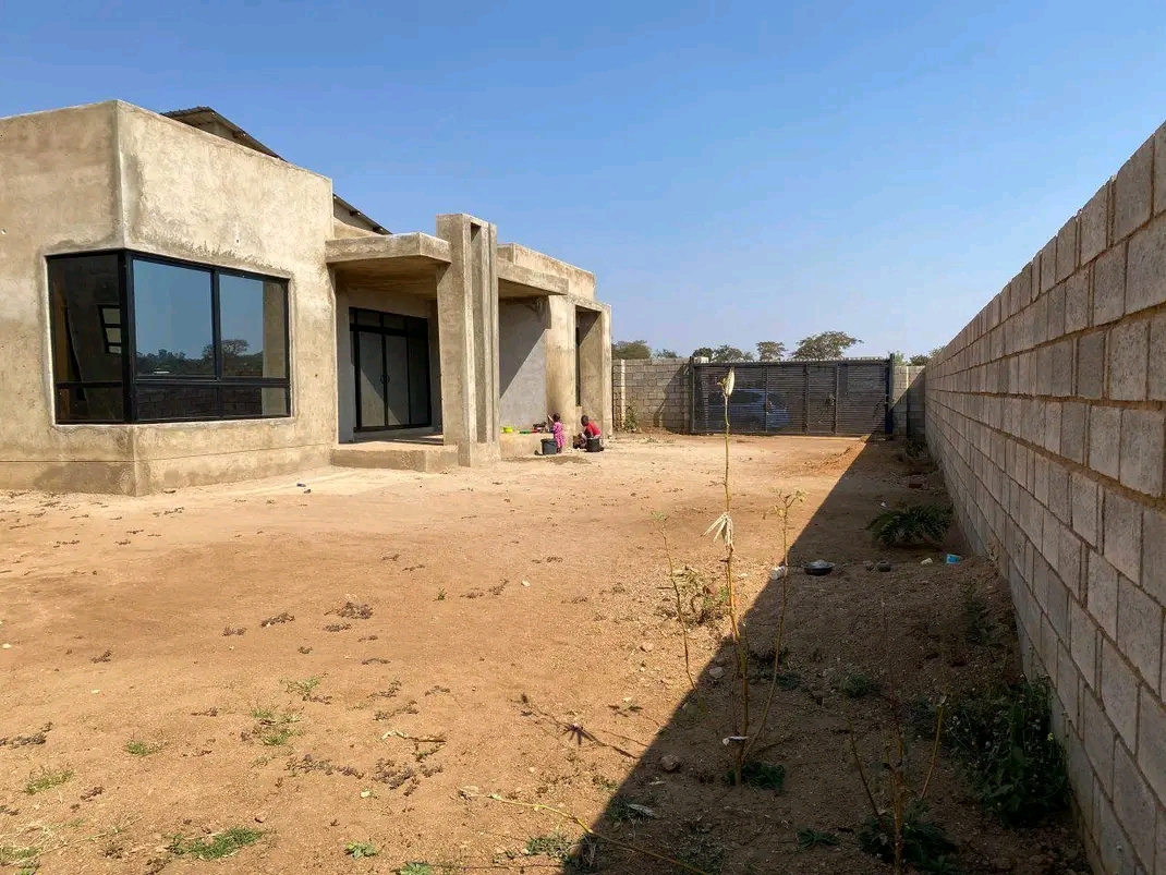 Two unfinished houses in the compound for sale in Airwing Lilongw