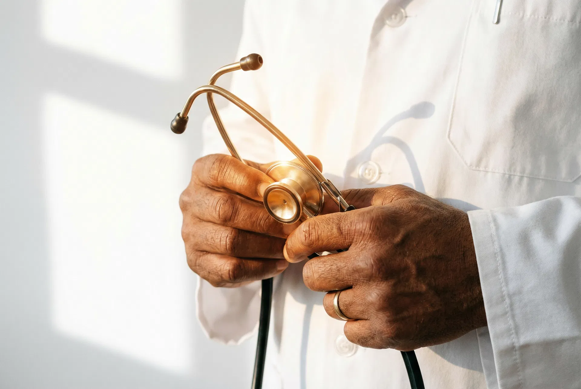 Doctor holding stethoscope
