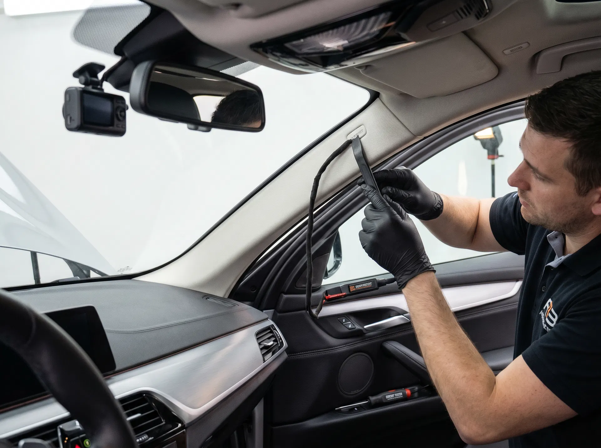 Hidden-wire dash cam installation detail