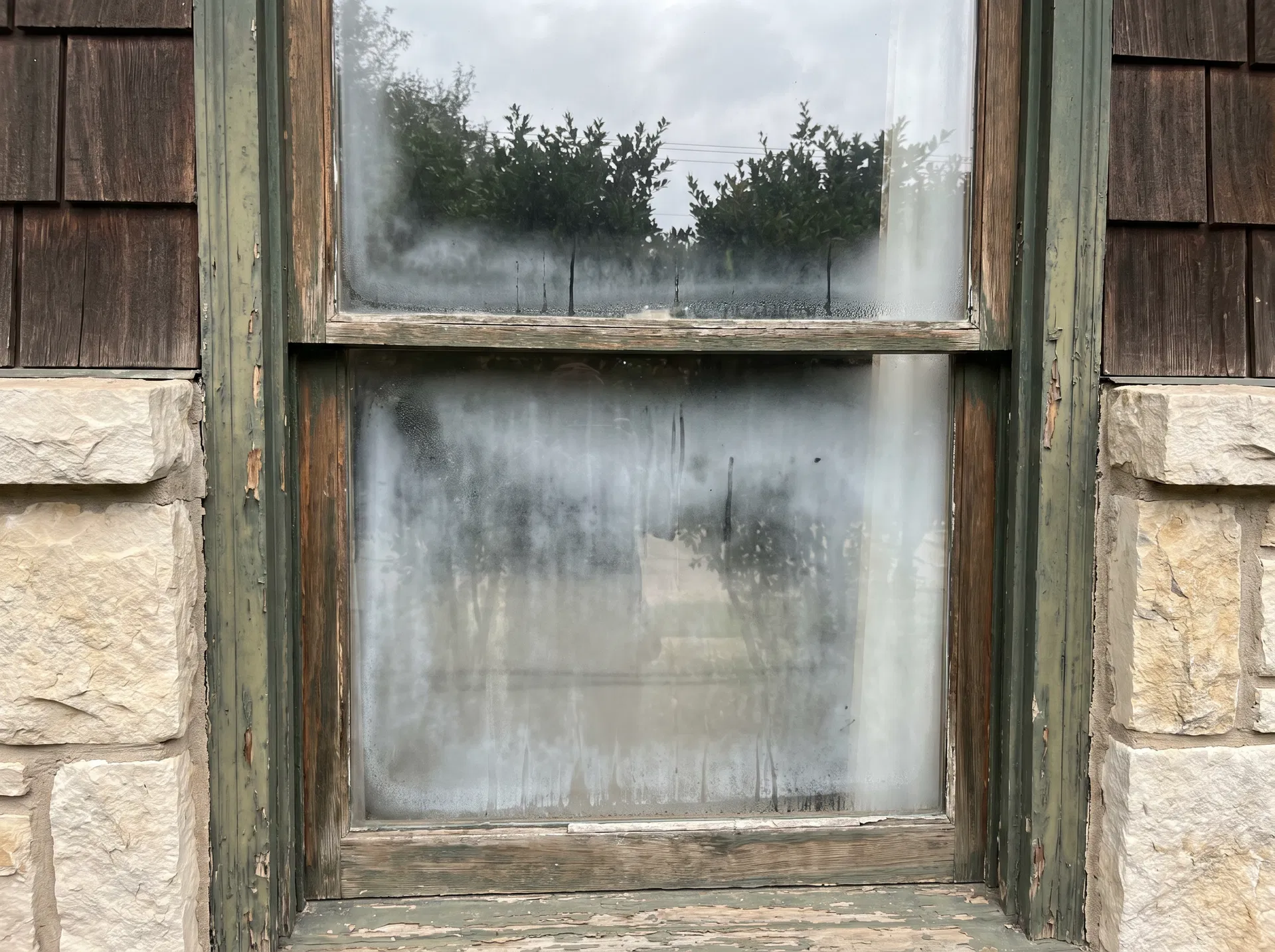 Before - Foggy double-hung window replaced with clear glass on Fort Worth TX craftsman home