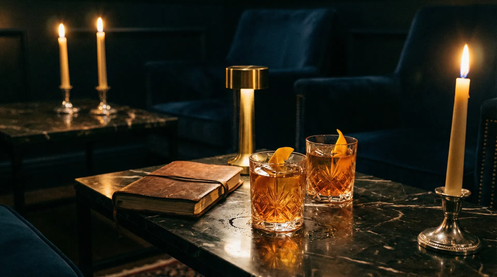 Intimate lounge setting with cocktails and warm lighting
