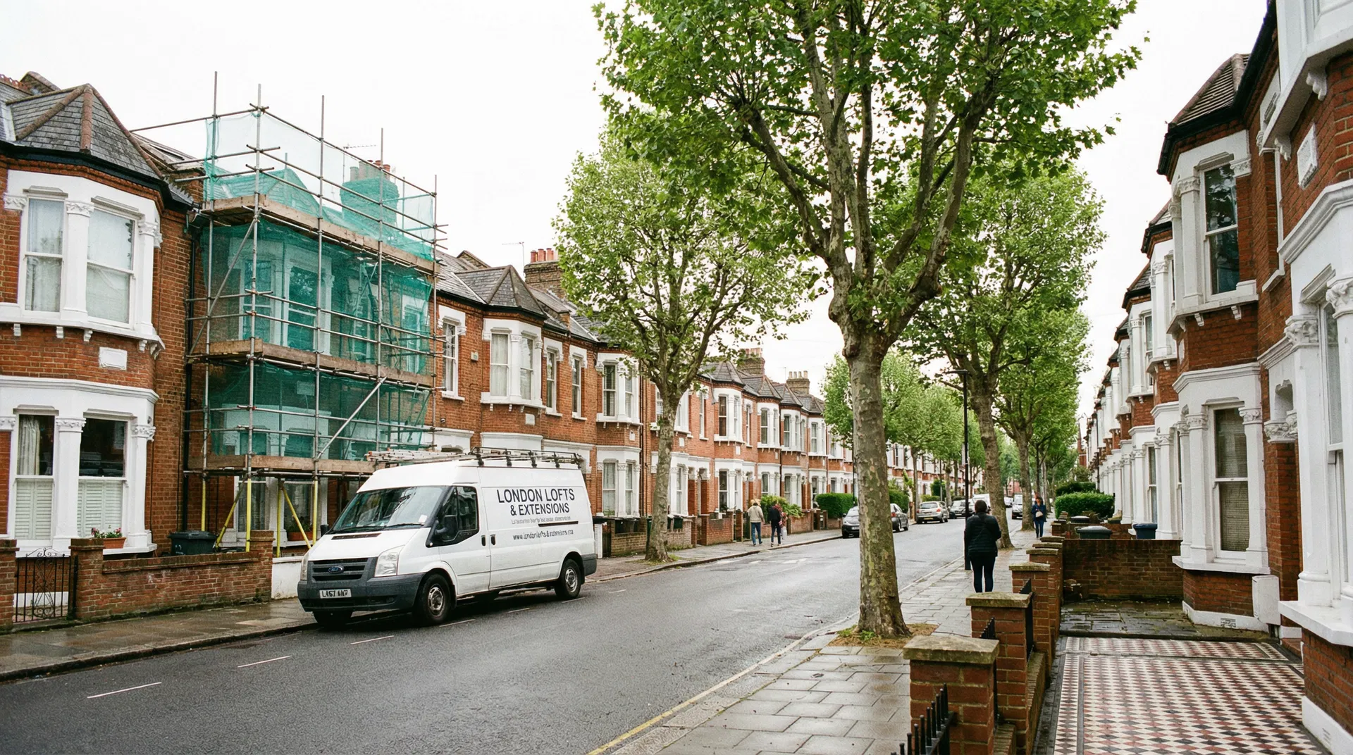 North London Victorian terraced street with scaffolding for loft conversion project