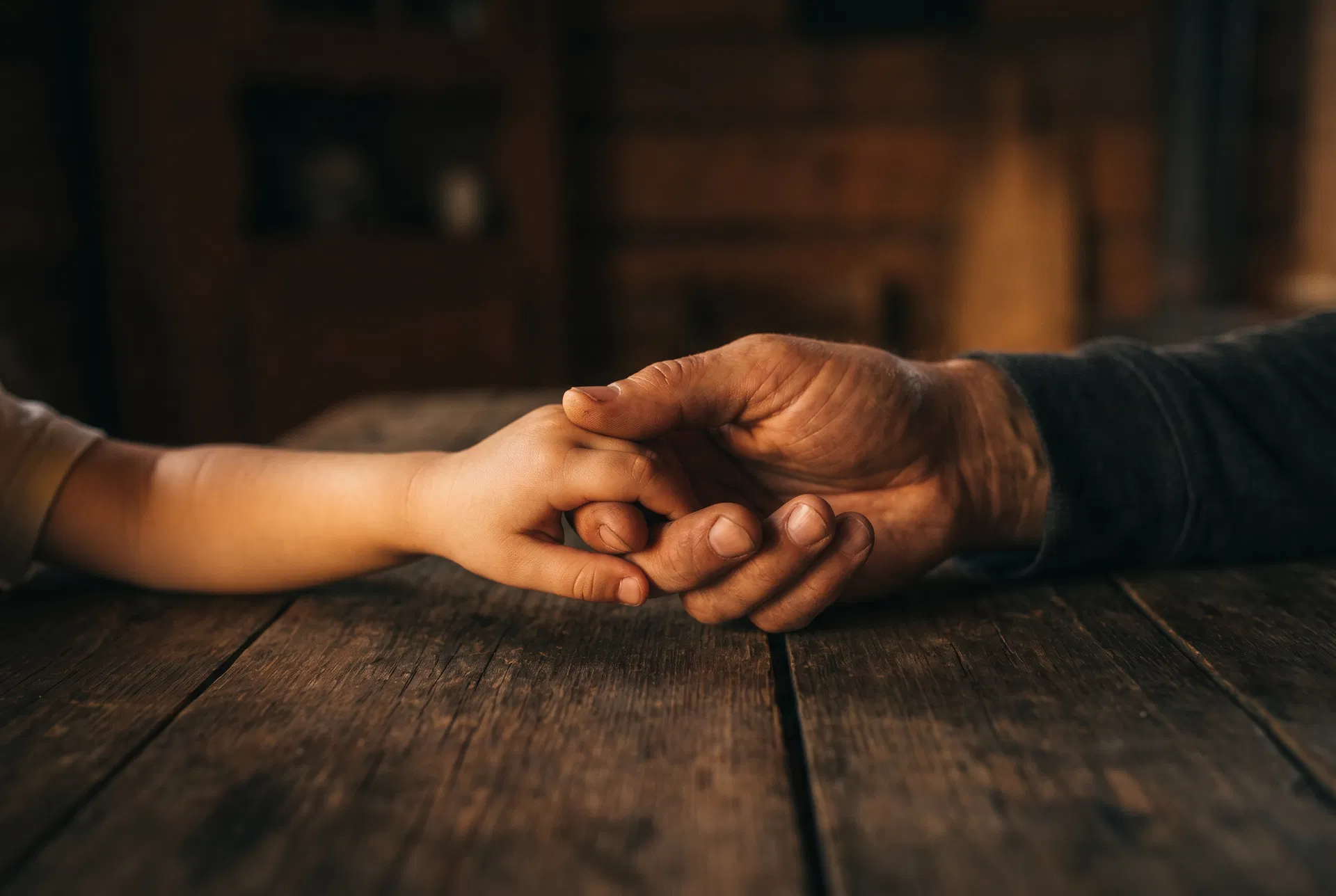 Parent and child holding hands