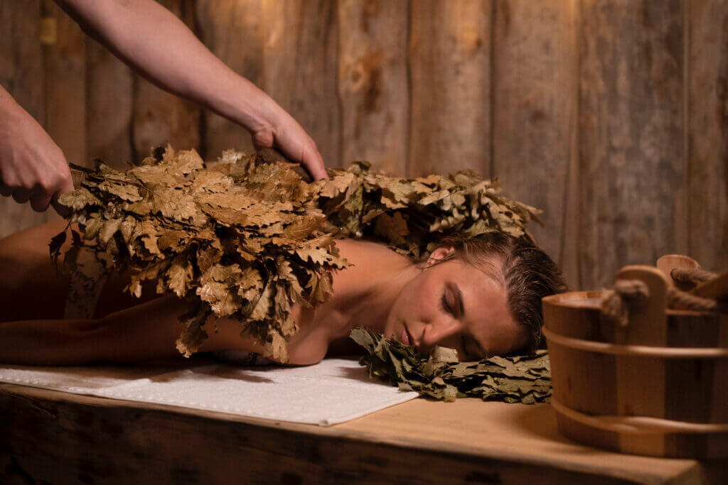 Traditional venik massage in banya