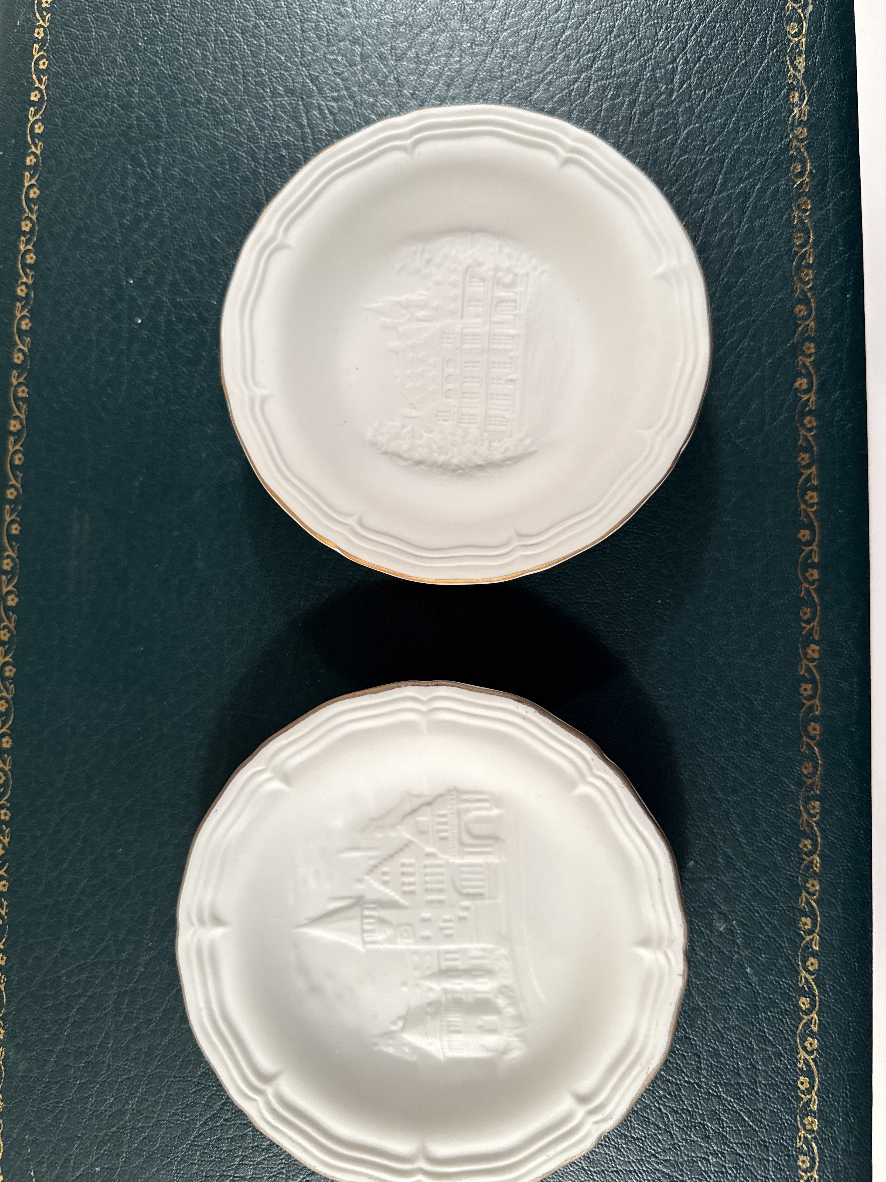 Höchst Porcelain Pair of Bisque Commemorative Dishes — Schlosshotel Kronberg, Wheel Mark, Moulded Castle Relief, Germany