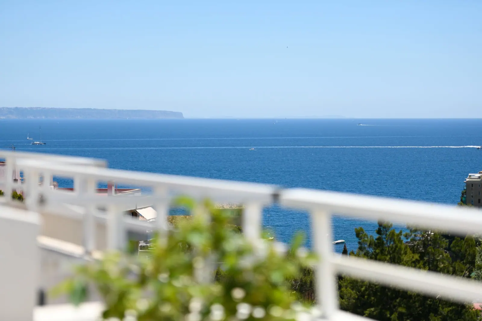 Sea view with boats across the bay from a penthouse terrace in Cas Català, Calvià