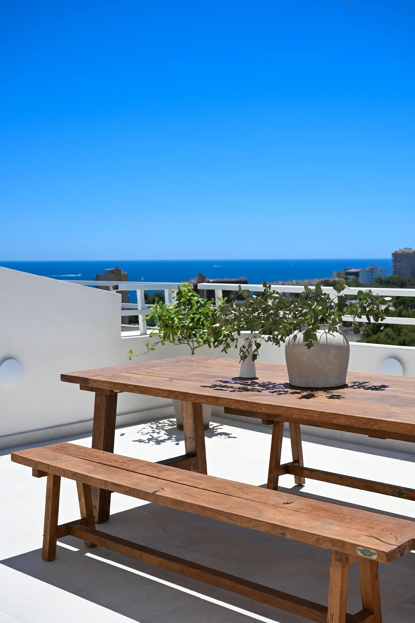 Terrace with open sea views from a renovated penthouse in Cas Català