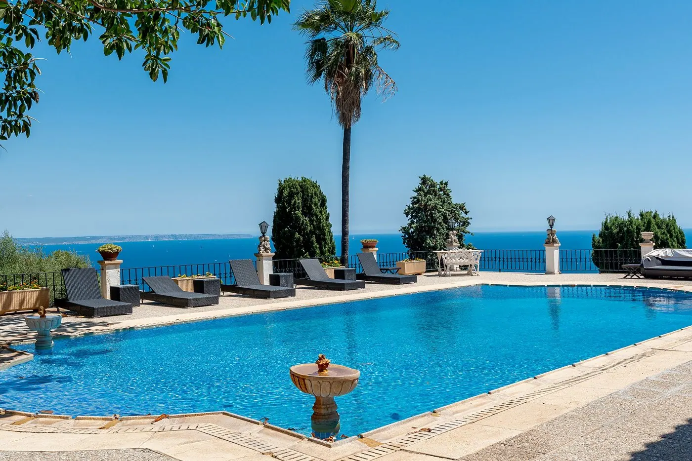 Pool terrace overlooking the Bay of Palma at an estate in Génova, Palma