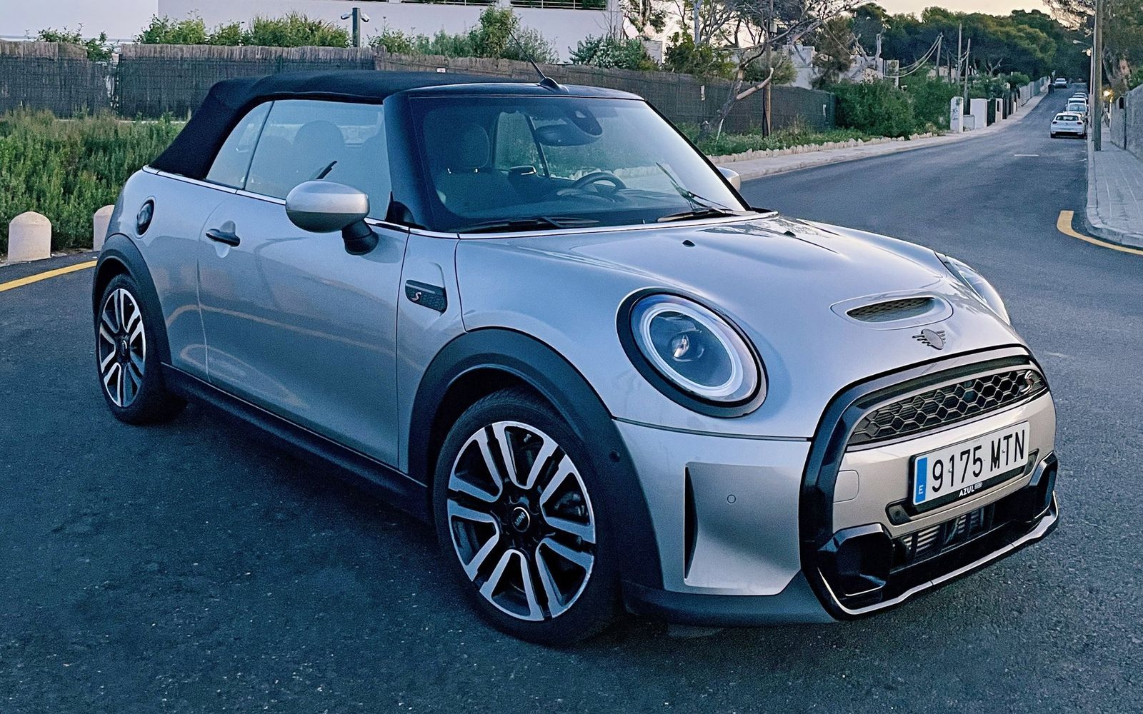 Silver Mini Cooper S Cabrio on a coastal road in Mallorca