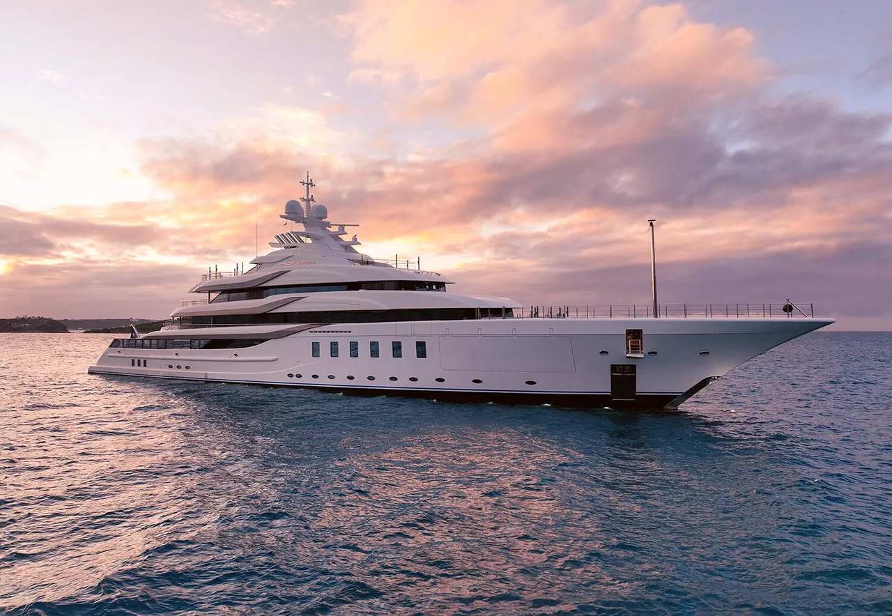 107-metre Benetti superyacht Lana under way at sunset