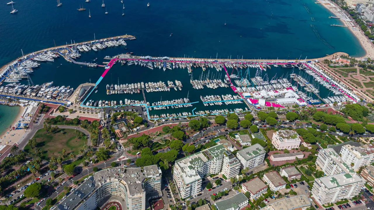 Aerial view of yachts and colourful walkways at Port Canto during the Cannes Yachting Festival.