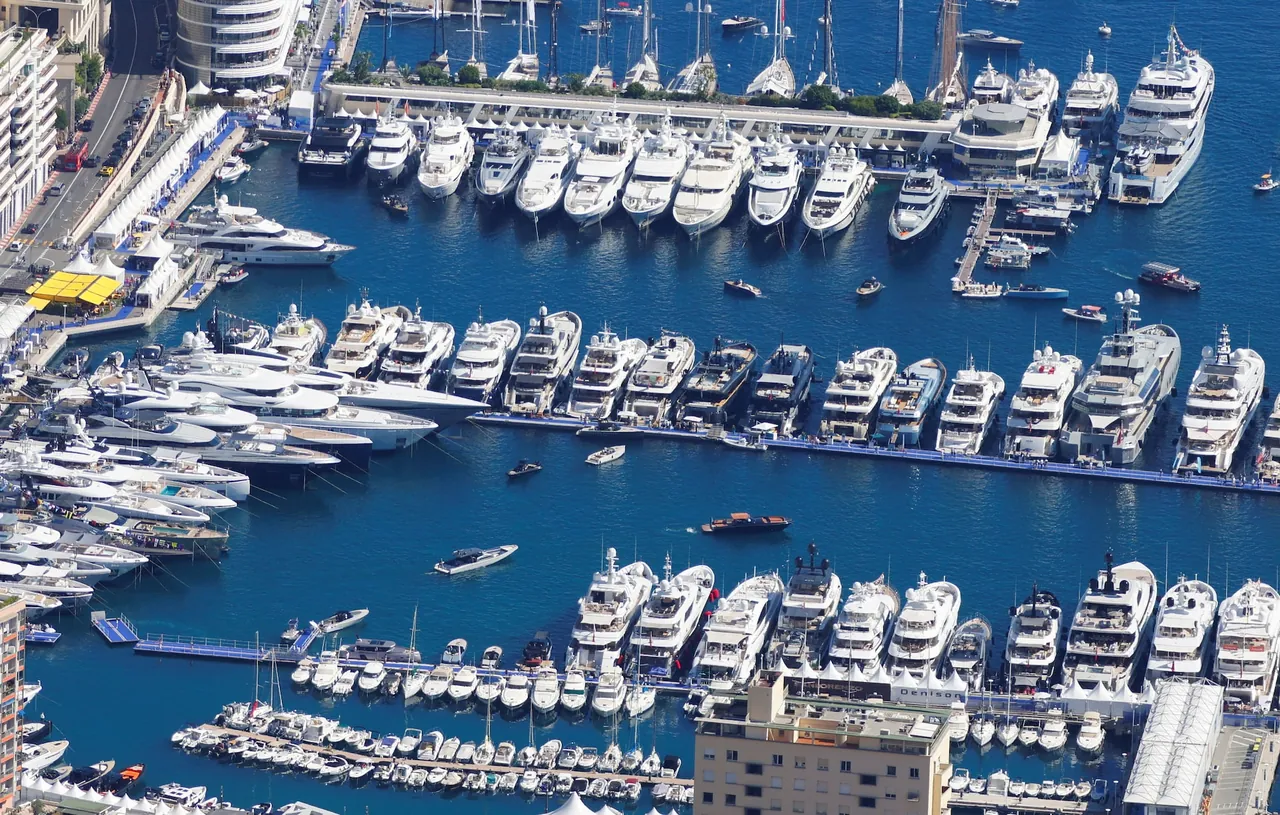 Aerial view of luxury yachts docked in Port Hercule marina, Monaco.