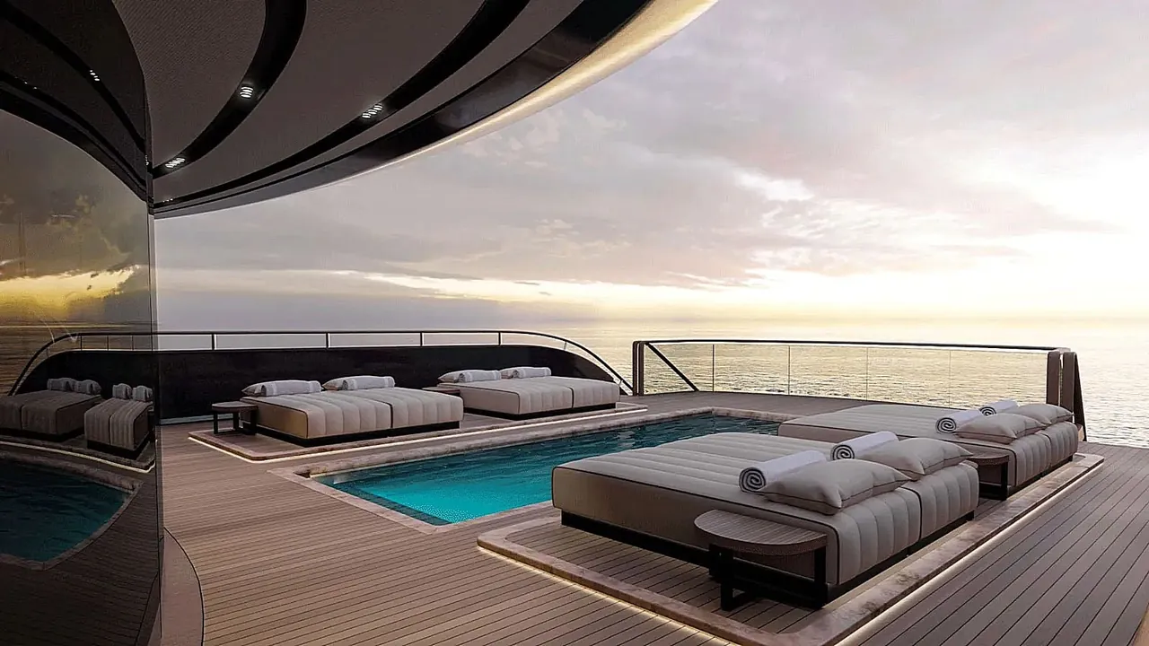Yacht deck pool and daybeds at sunset