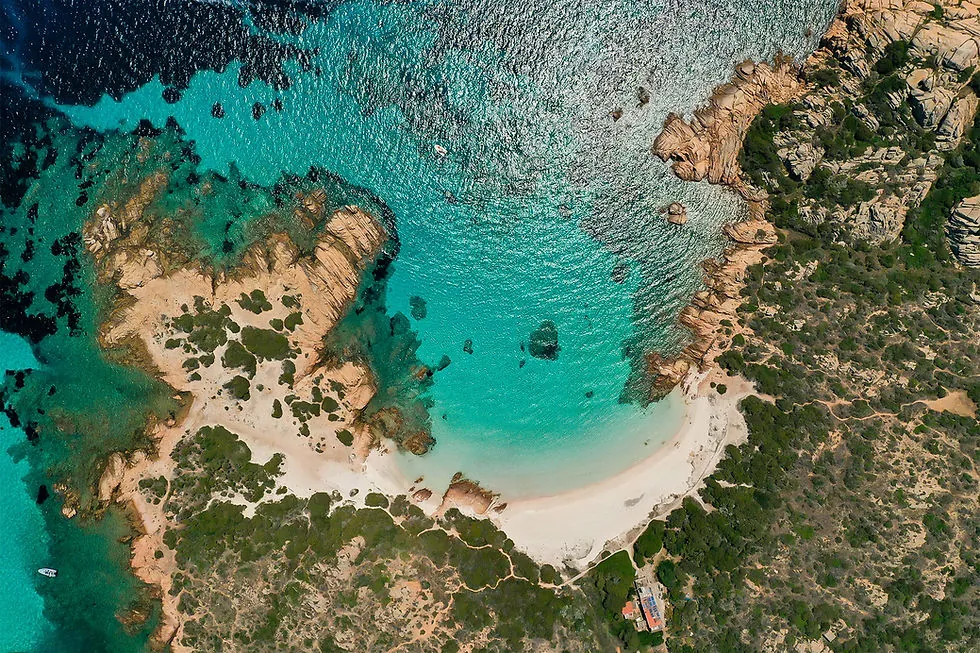Aerial view of Budelli Island’s pink sand beach and turquoise waters in Sardinia