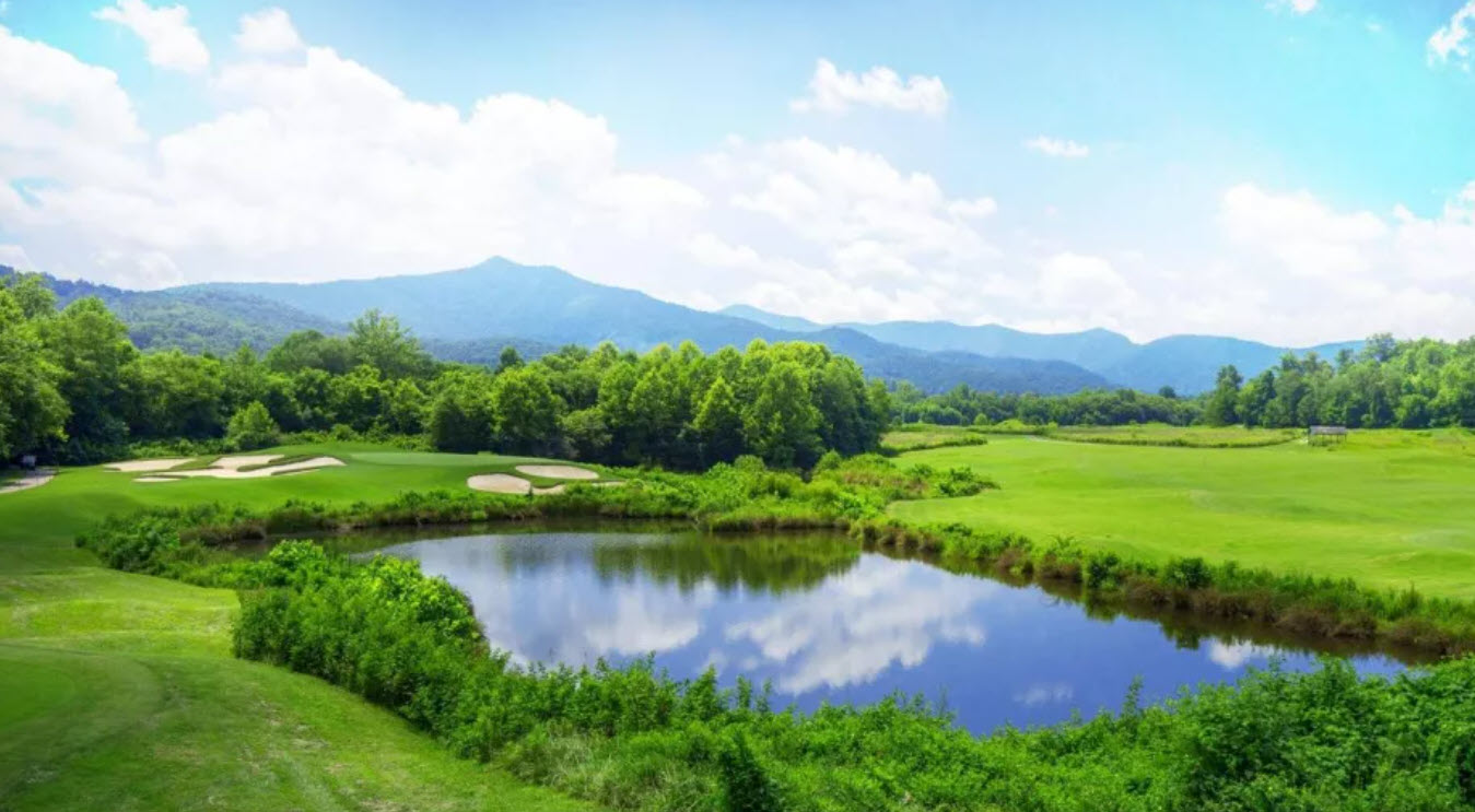 Panoramic view of Brasstown Valley Resort Golf Course with lush green fairways and mountains in the background