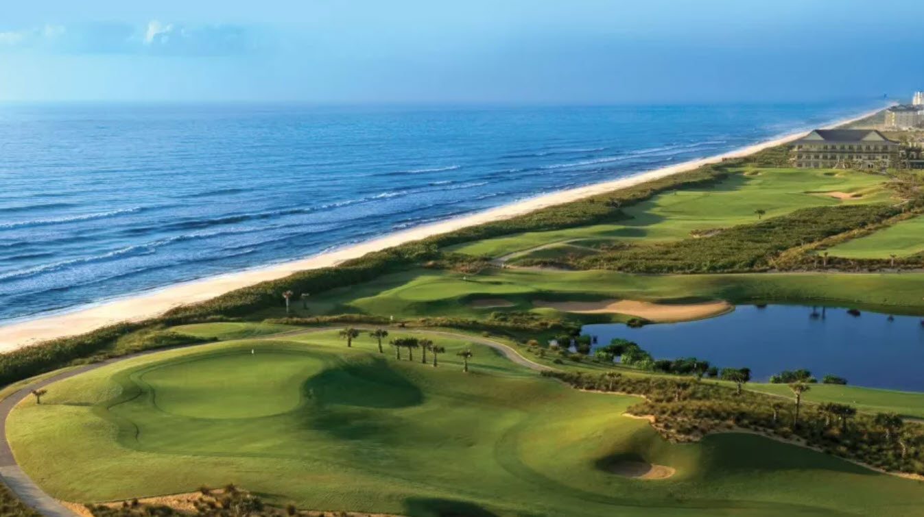 Panoramic view of the 18th hole at Hammock Beach Ocean Course with the Atlantic Ocean in the background