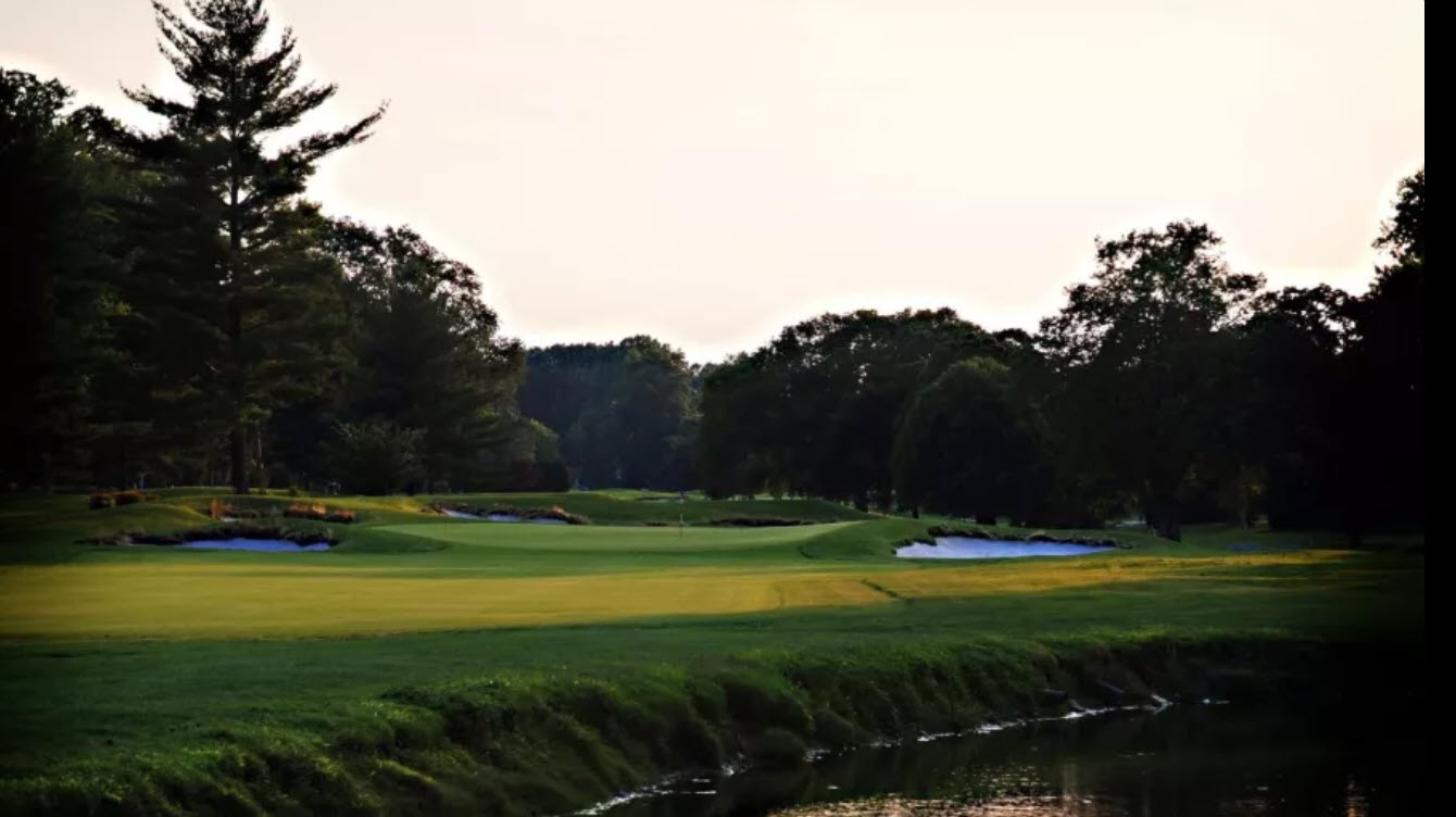 Lush green fairway and trees at Llanerch Country Club golf course in Havertown, PA