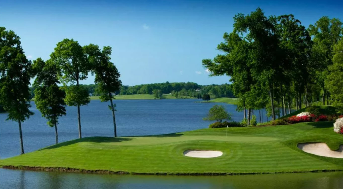 Panoramic view of the 18th hole at Robert Trent Jones Golf Club with Lake Manassas in the background