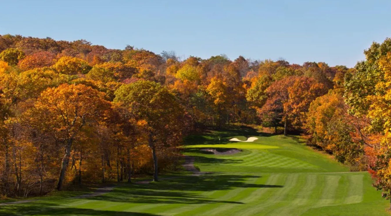 Panoramic view of Devils Knob Golf Course at Wintergreen Resort with Blue Ridge Mountains in the background