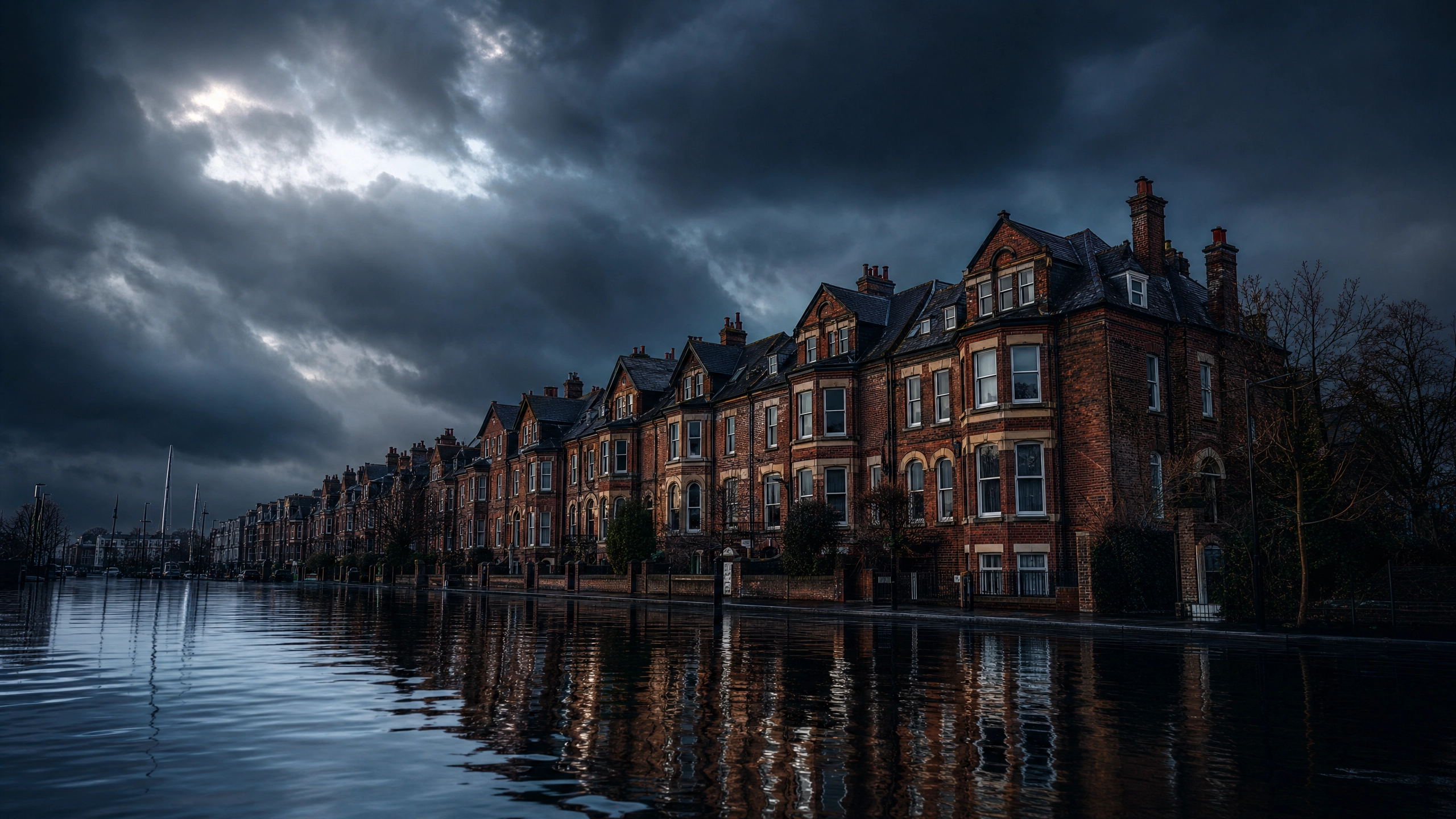 UK property with storm clouds and flood risk