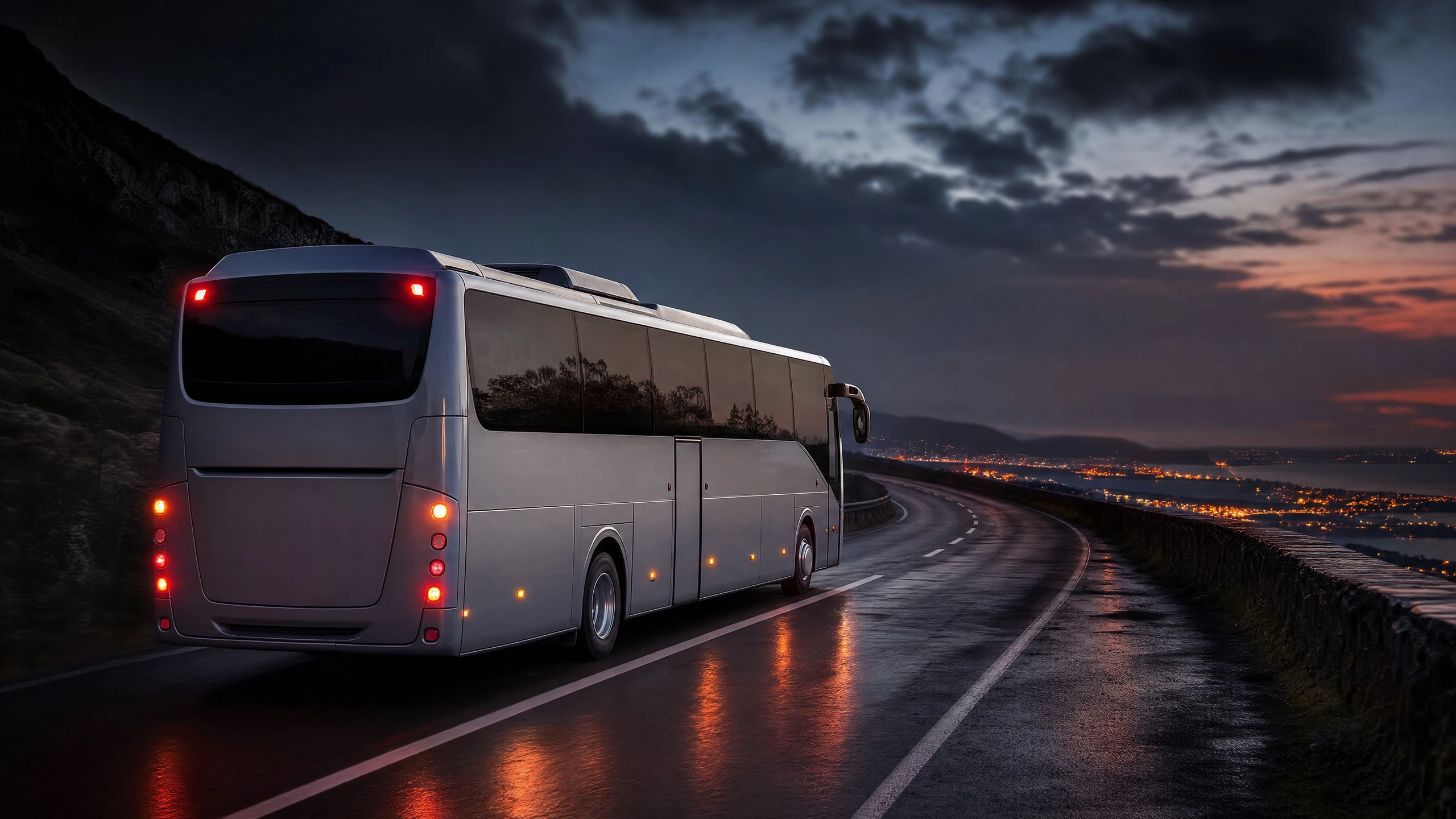 Modern coach on UK road at dusk