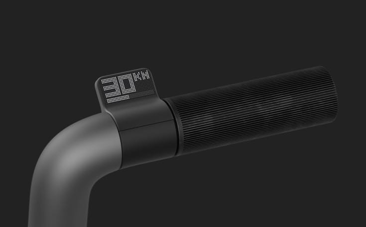 The handlebar of a bike with a clock on it shines with a unique design concept.