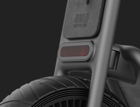 A close up of a 2019 electric scooter with a red light, featuring a great design that shines.