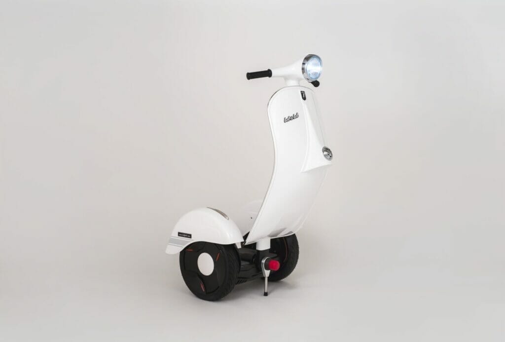 A white scooter on a white background.