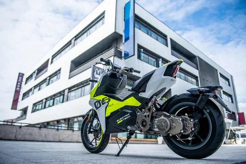 a motorcycle parked on the side of a building