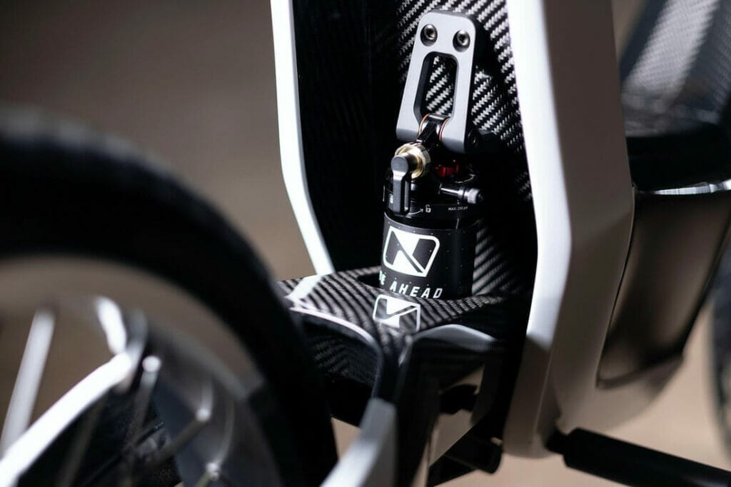 A close up of a bicycle with a carbon handlebar.