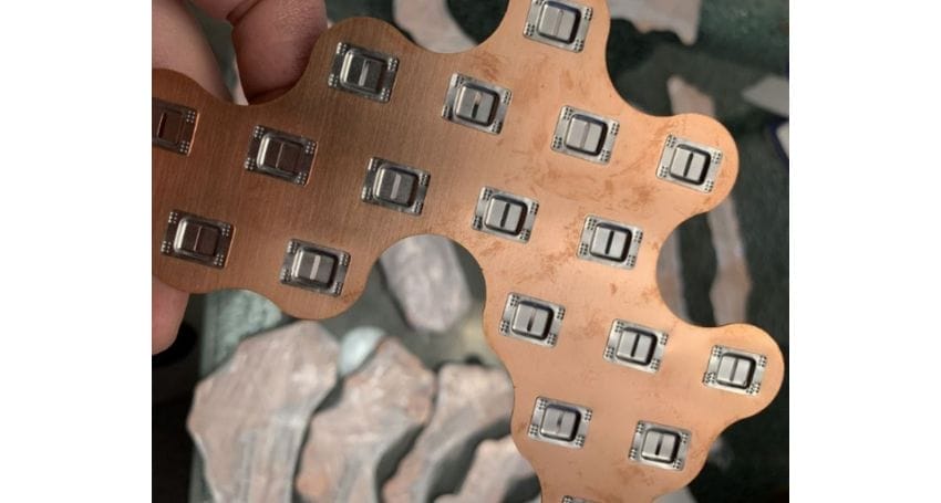 A person is holding a piece of metal for an Electric Bike Conversion.