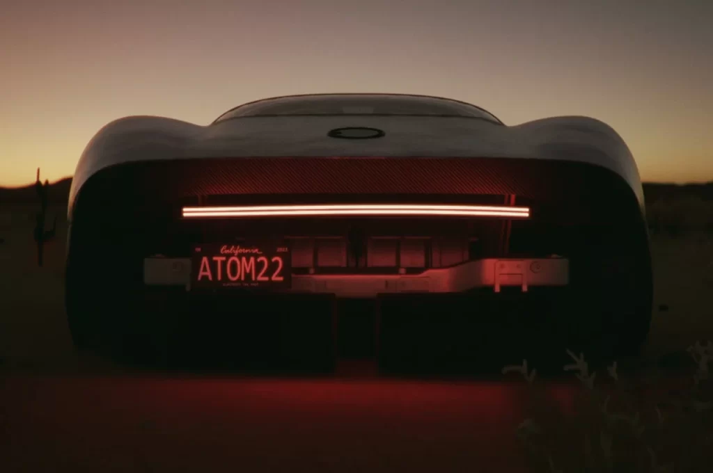 The back of an Auto in the desert at dusk.