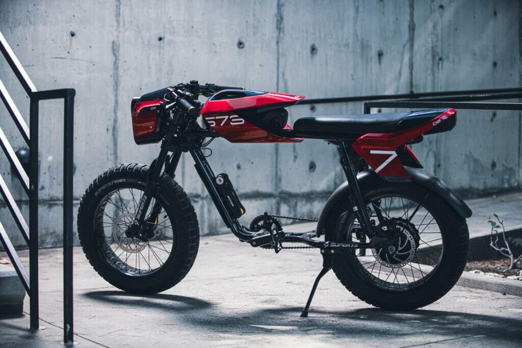 a motorcycle parked on the side of a building