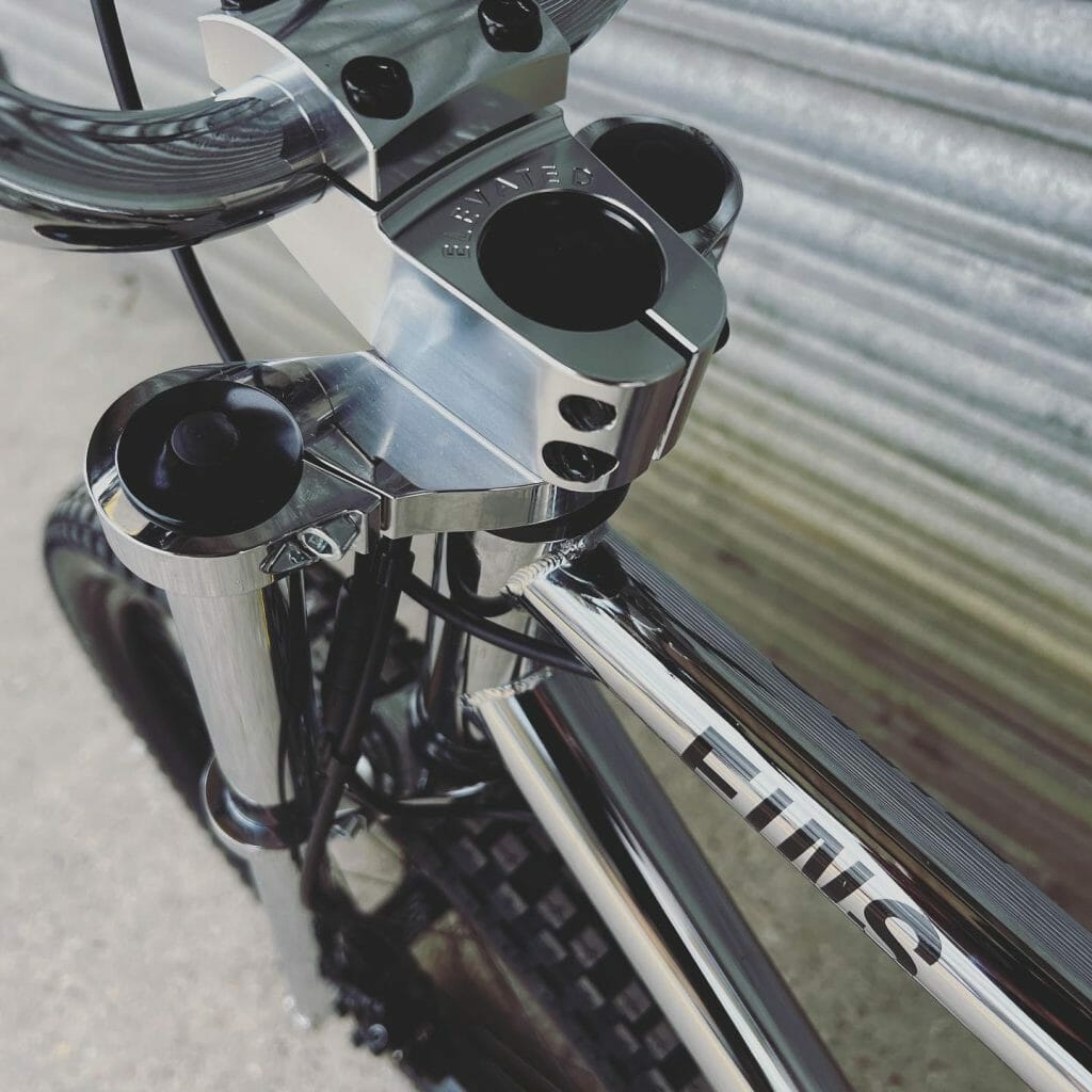 A close up of the handlebars of a bike.