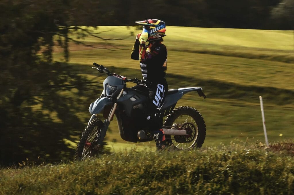 dirt bike, grassy hill