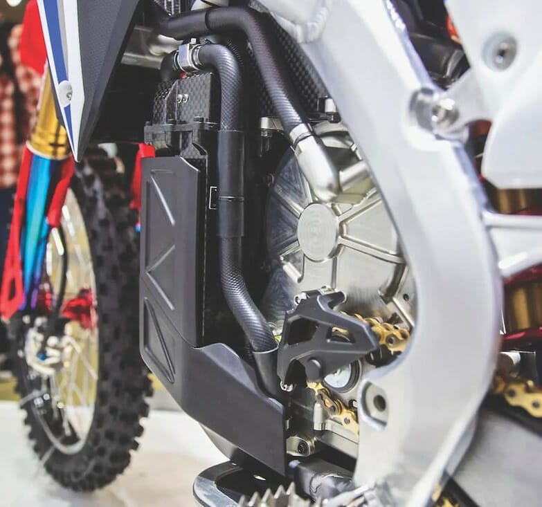 The front end of Honda's CR ELECTRIC PROTO dirt bike on display at Japan Motocross 2023.