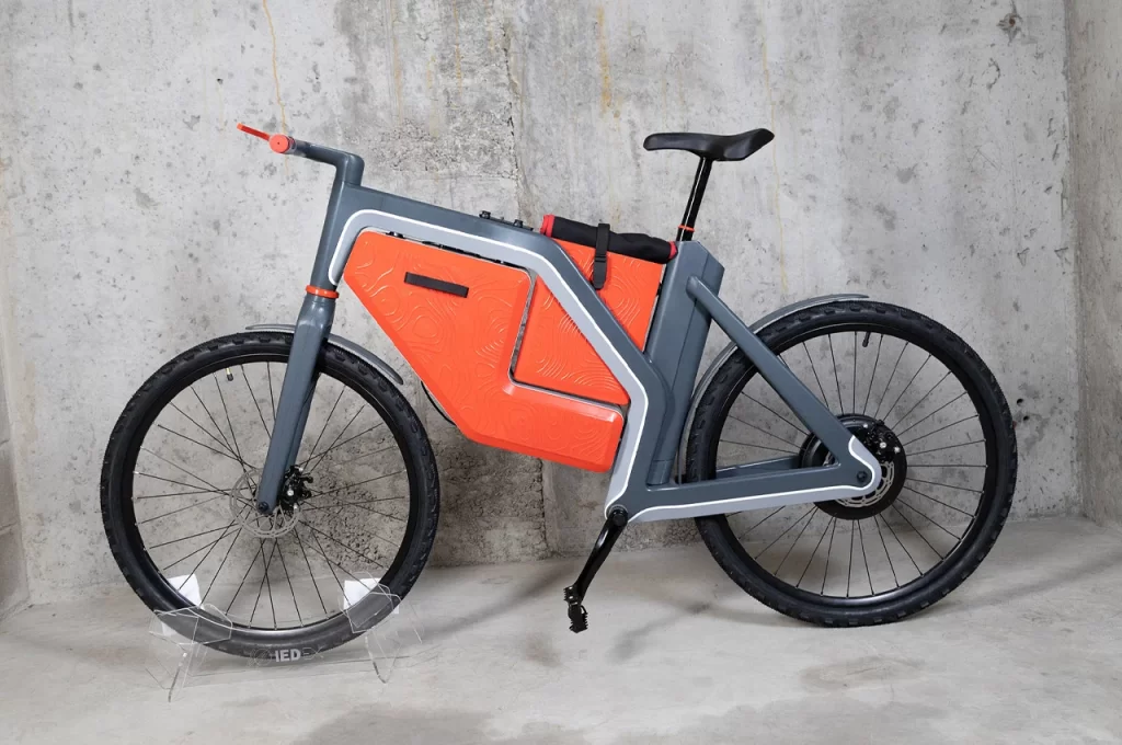 a bicycle parked on the side of a building