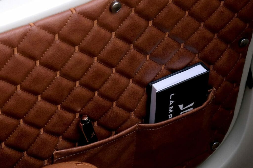 Brown, leather, car seat, book.