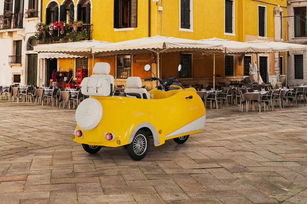 Yellow scooter, yellow building.