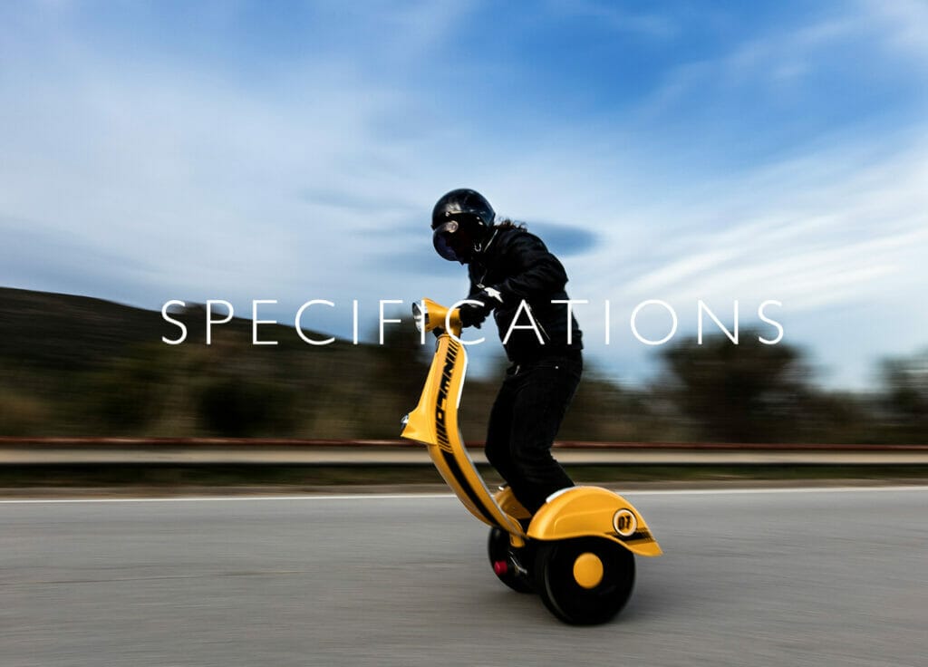 A person riding a yellow scooter with the words specifications.