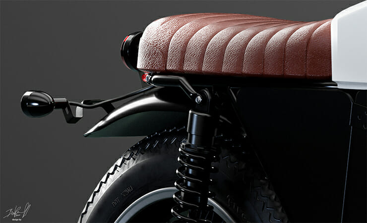 A black and white motorcycle with a leather seat.