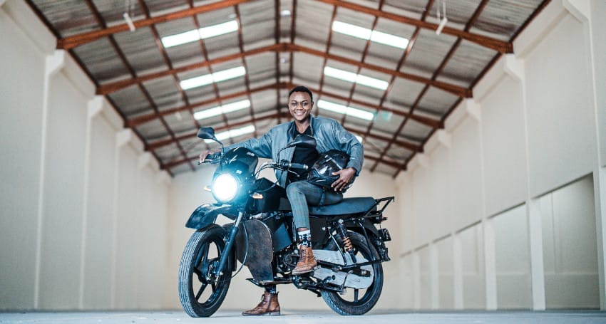 A woman is sitting on an <a href=