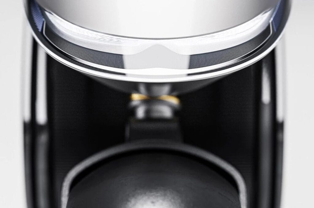 A close up of the front end of an Electric Café Racer Superbike blending 60s elegance.