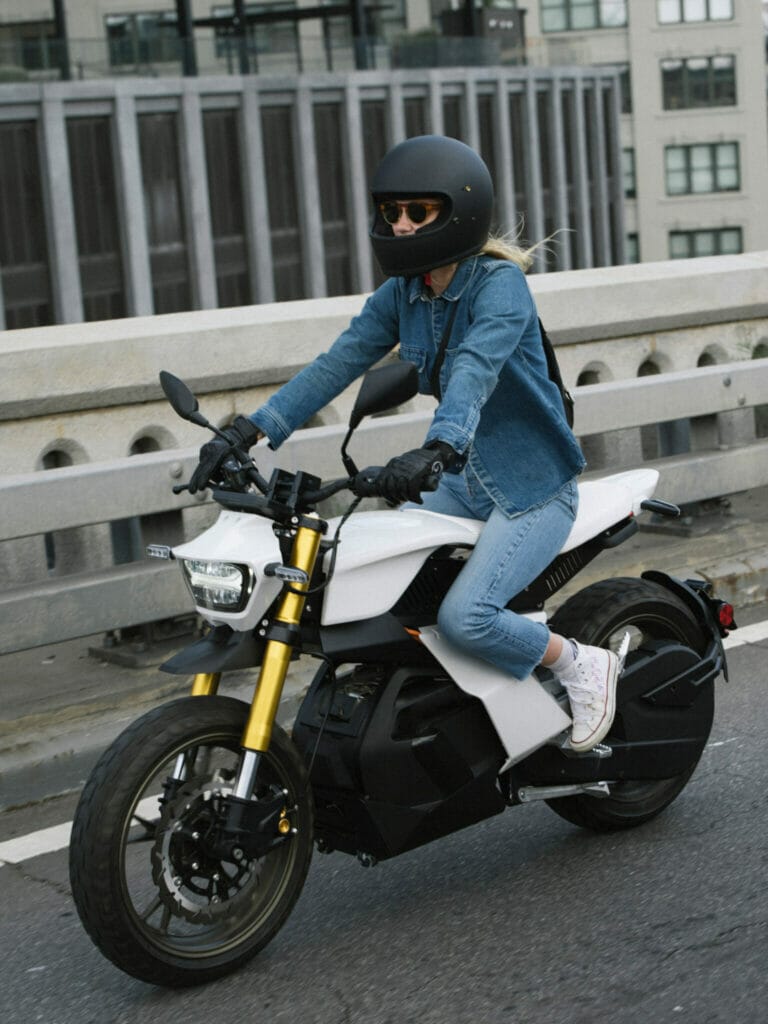 Keywords: woman, motorcycle