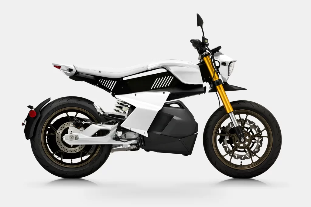 A white and black motorcycle is shown against a white background.