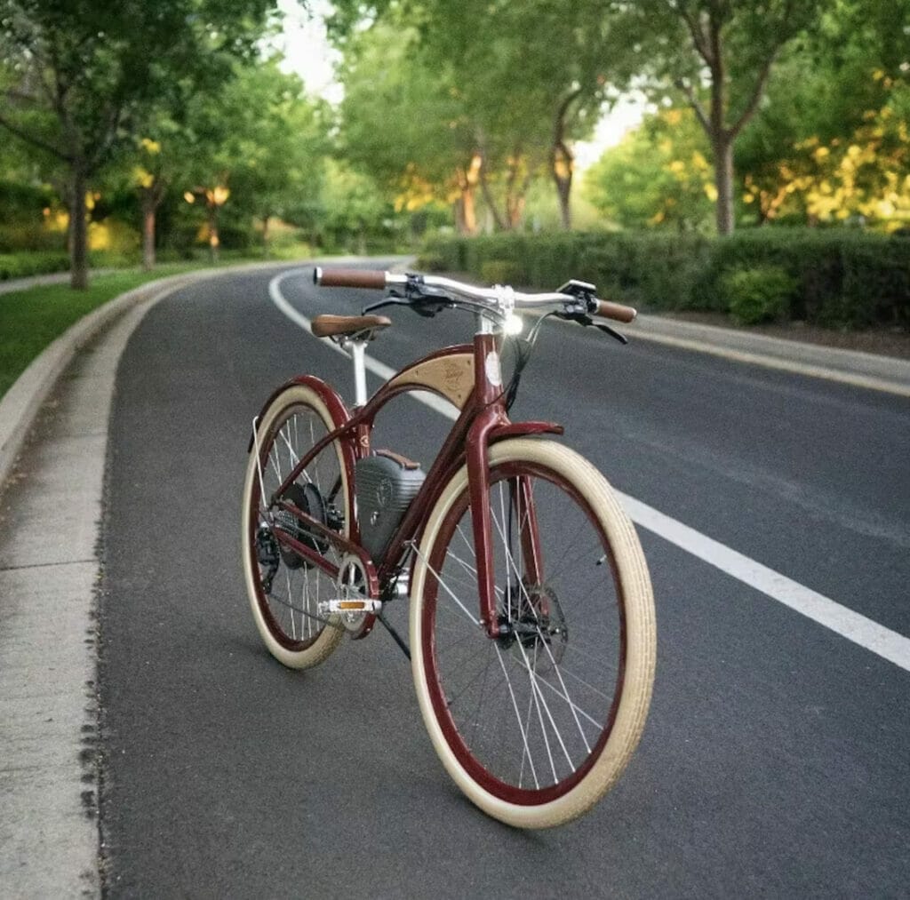 A red eBike is parked on the side of a road, demonstrating sustainability.