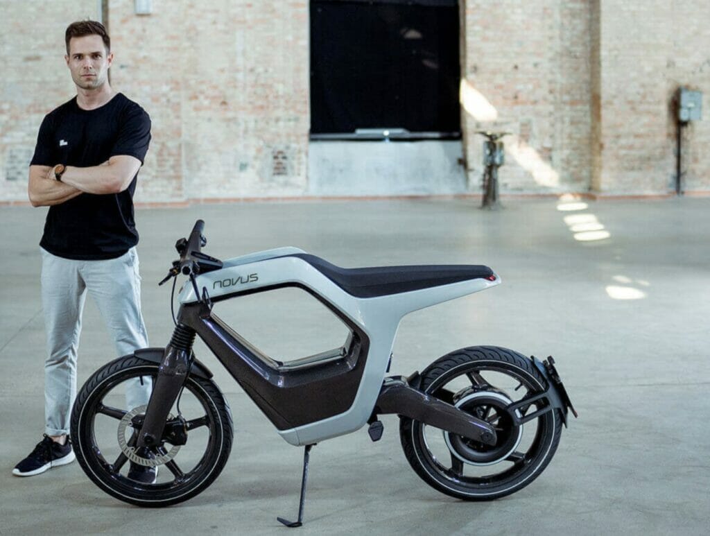 A man standing next to an <a href=