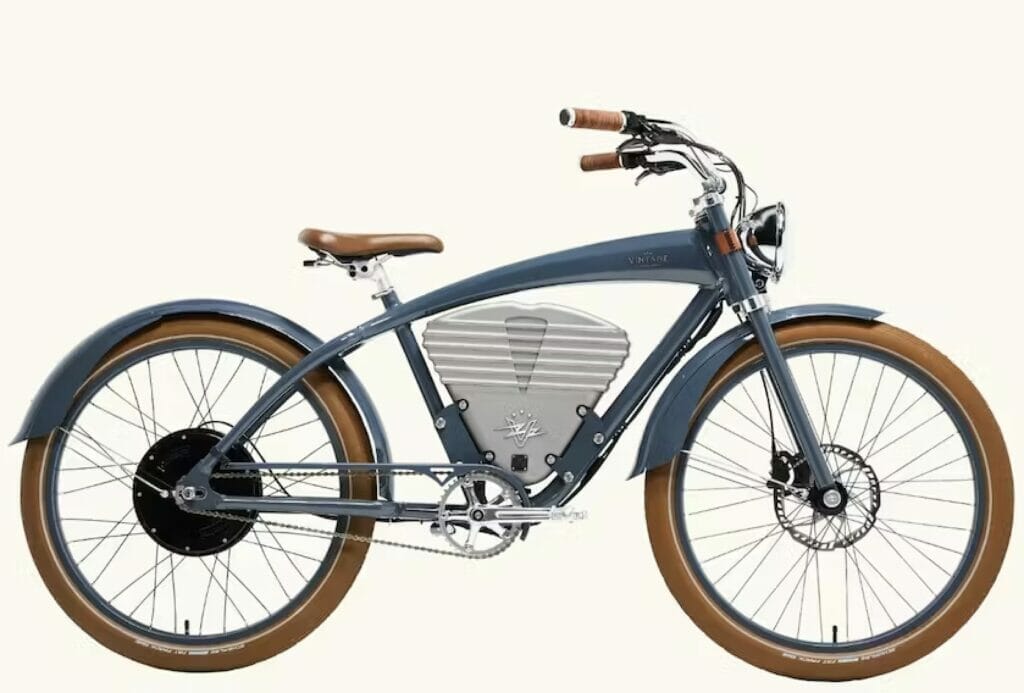 An electric bike showcases high-quality vintage design against a white background.