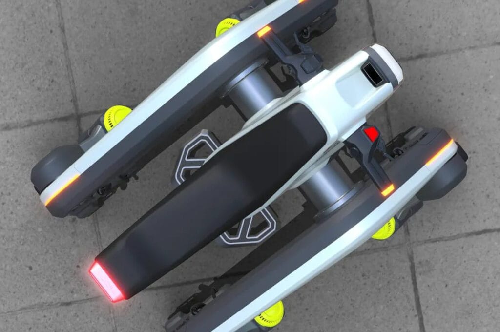 A white scooter with a red light on it is available for purchase.